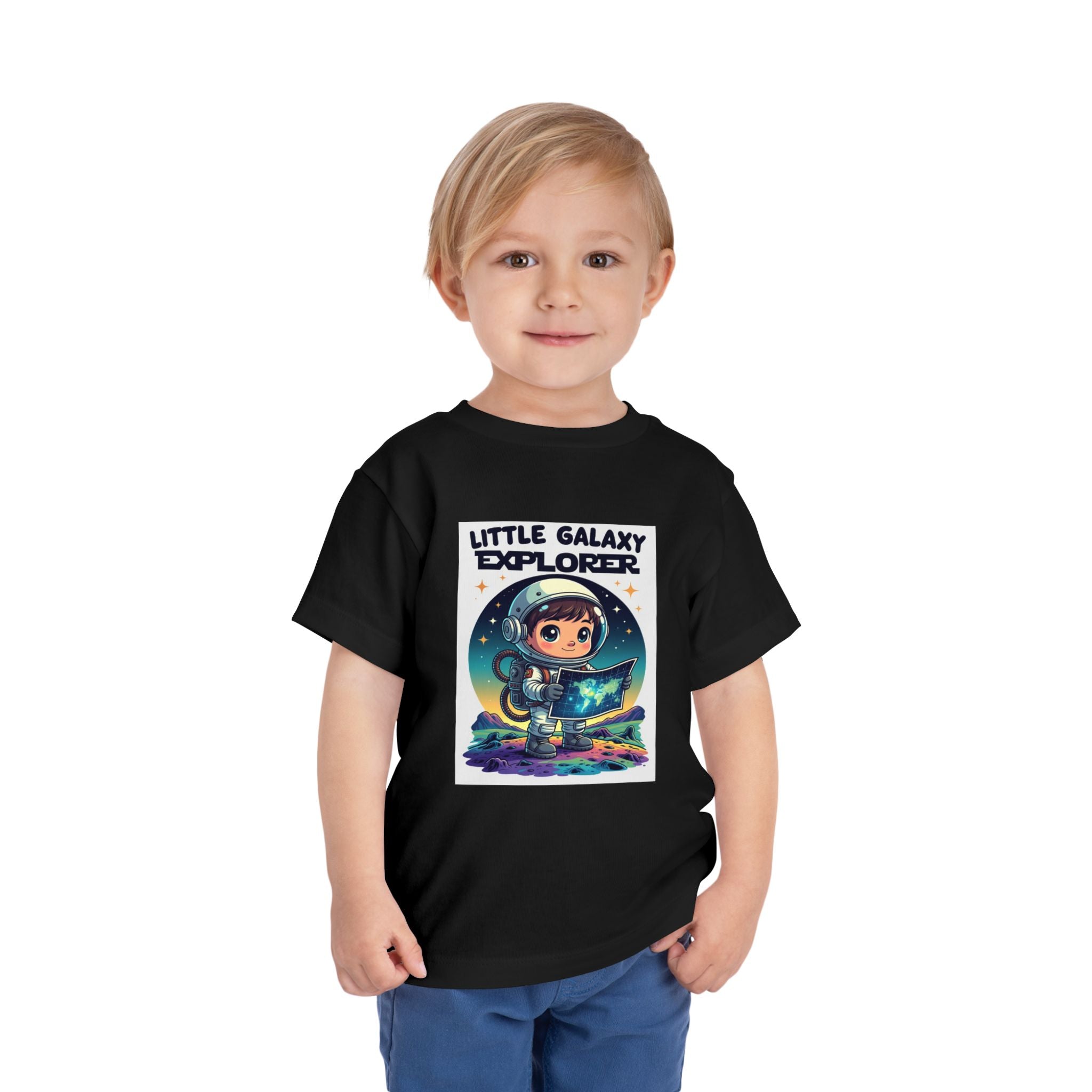 Black kids' t-shirt featuring a cartoon astronaut holding a map, with "Little Galaxy Explorer" text above.