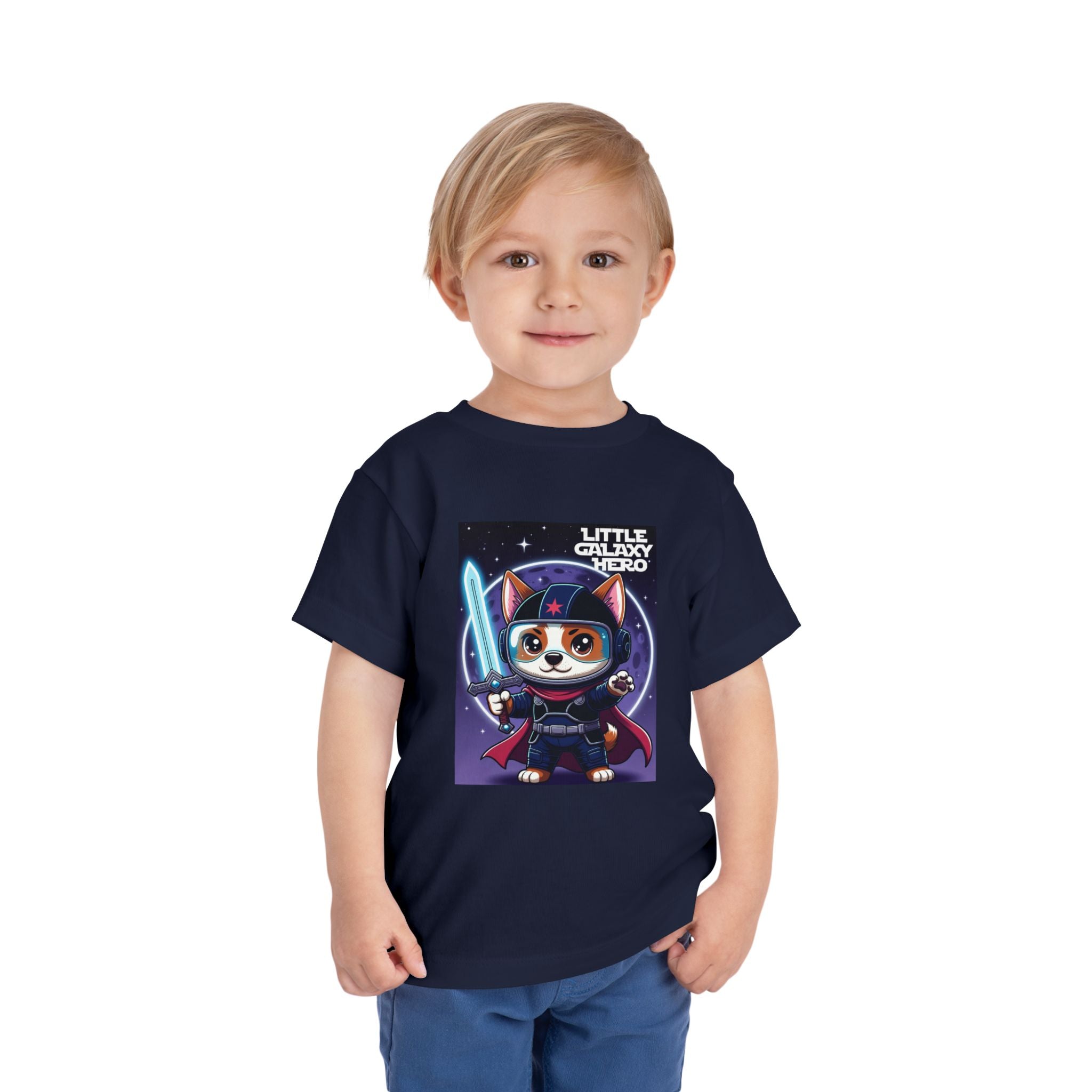 Little Galaxy Hero kids t-shirt featuring a cartoon space puppy with a lightsaber on a navy background.