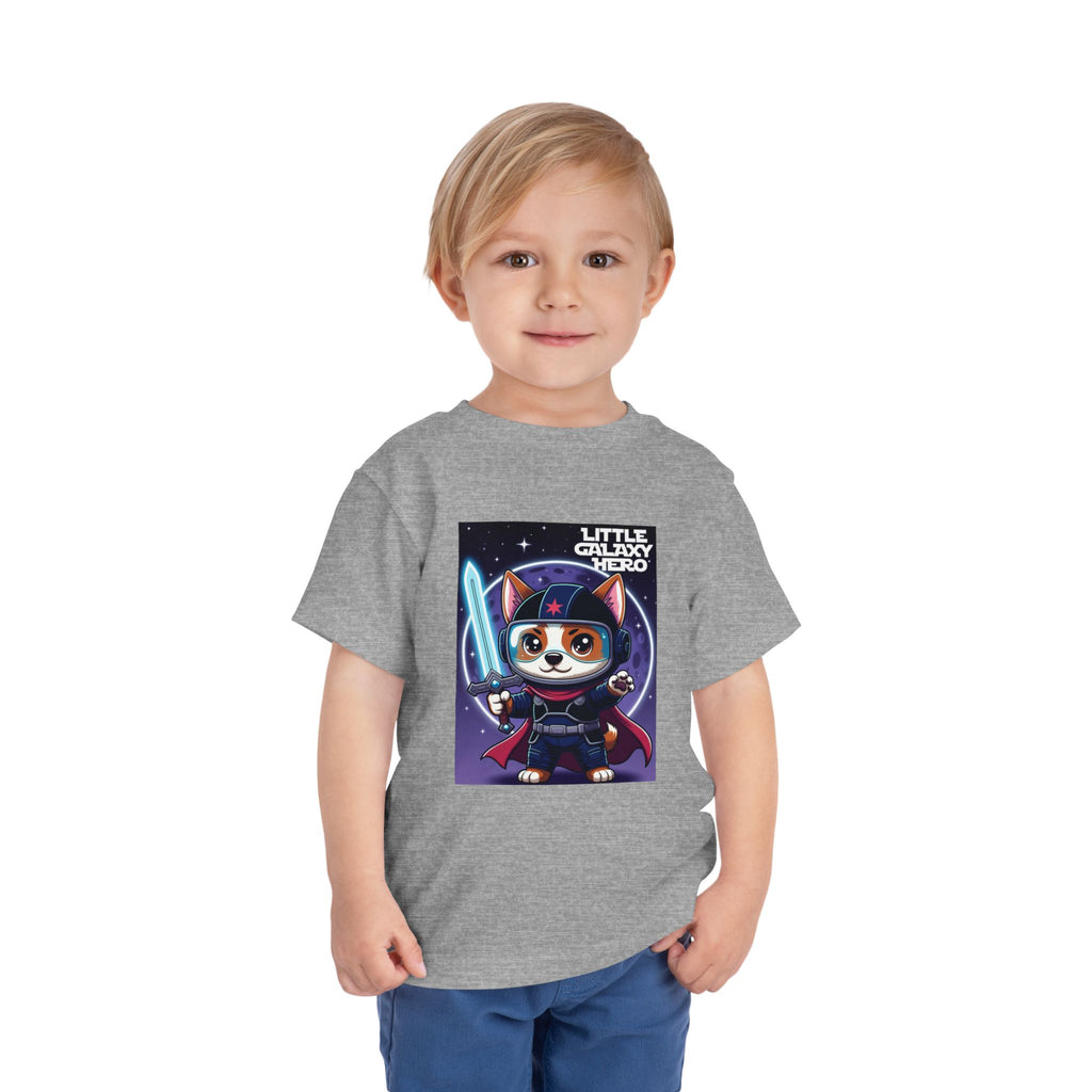 Little Galaxy Hero kids t-shirt in gray featuring a cartoon space puppy with a lightsaber and starry background.
