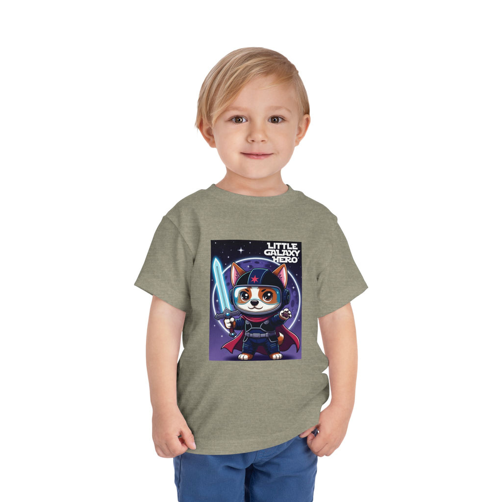 Little Galaxy Hero kids t-shirt featuring a cartoon space puppy with a lightsaber on a gray background.