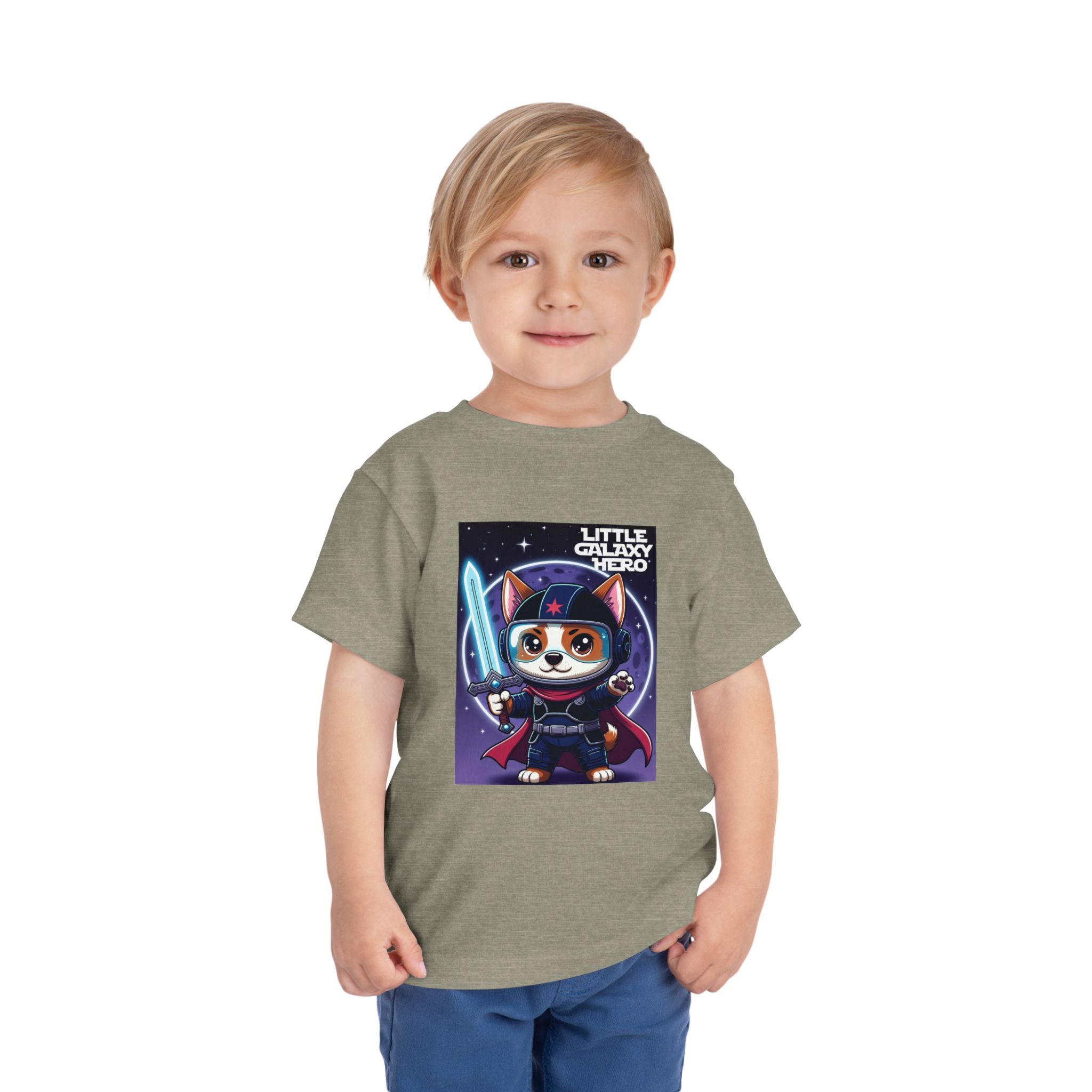 Little Galaxy Hero kids t-shirt featuring a cartoon space puppy with a lightsaber on a gray background.