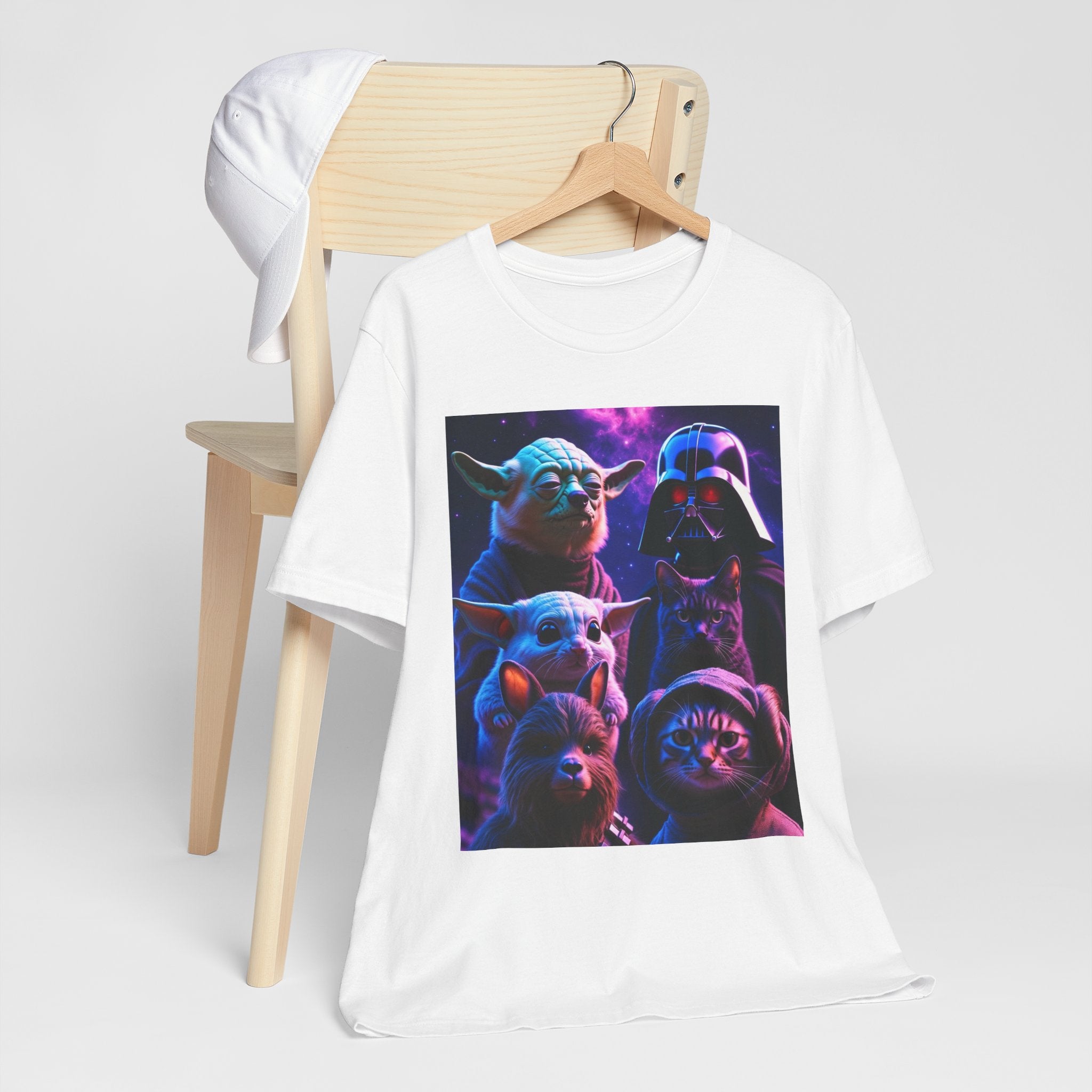 Pawsitive Force T-shirt featuring a graphic of cats and dogs styled as Star Wars characters on a white background.
