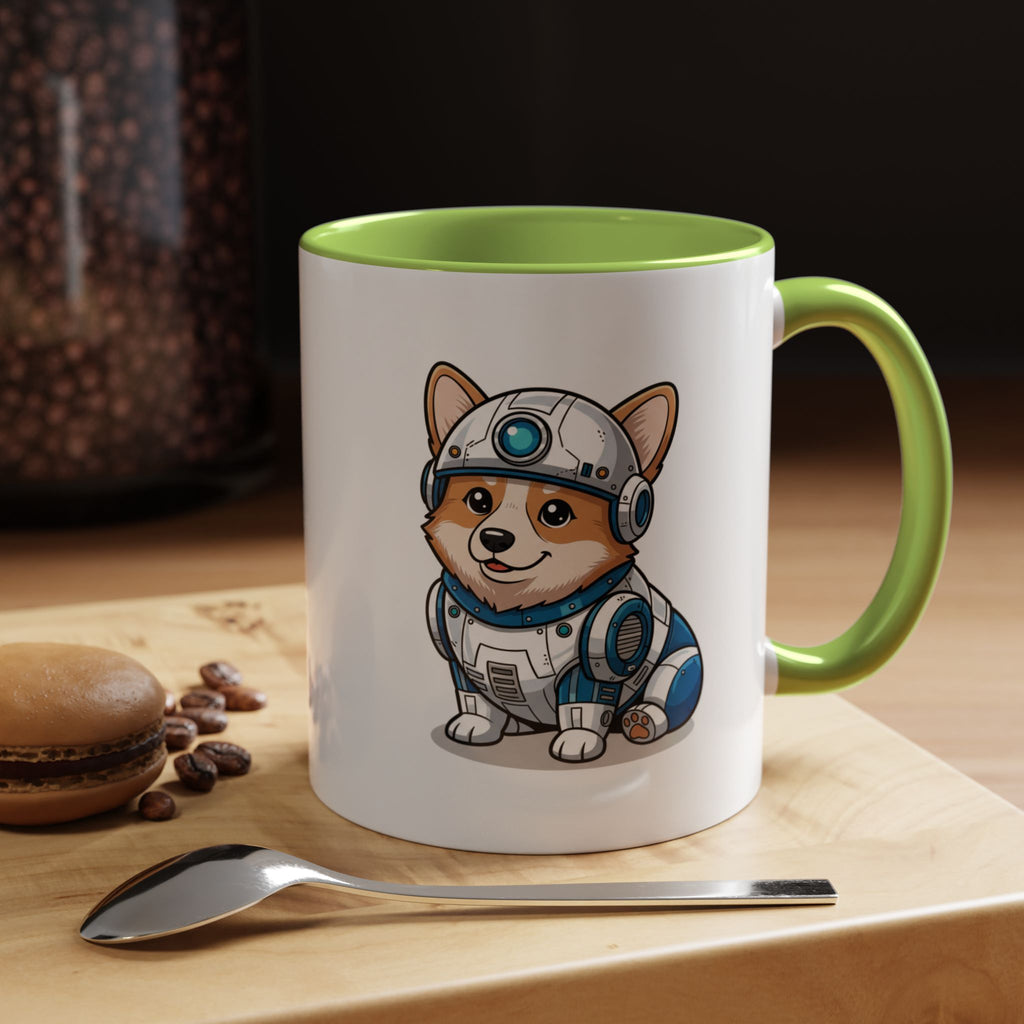 Corgi R2-D2 coffee mug with a green handle, featuring a cartoon corgi in a droid outfit on a wooden surface.