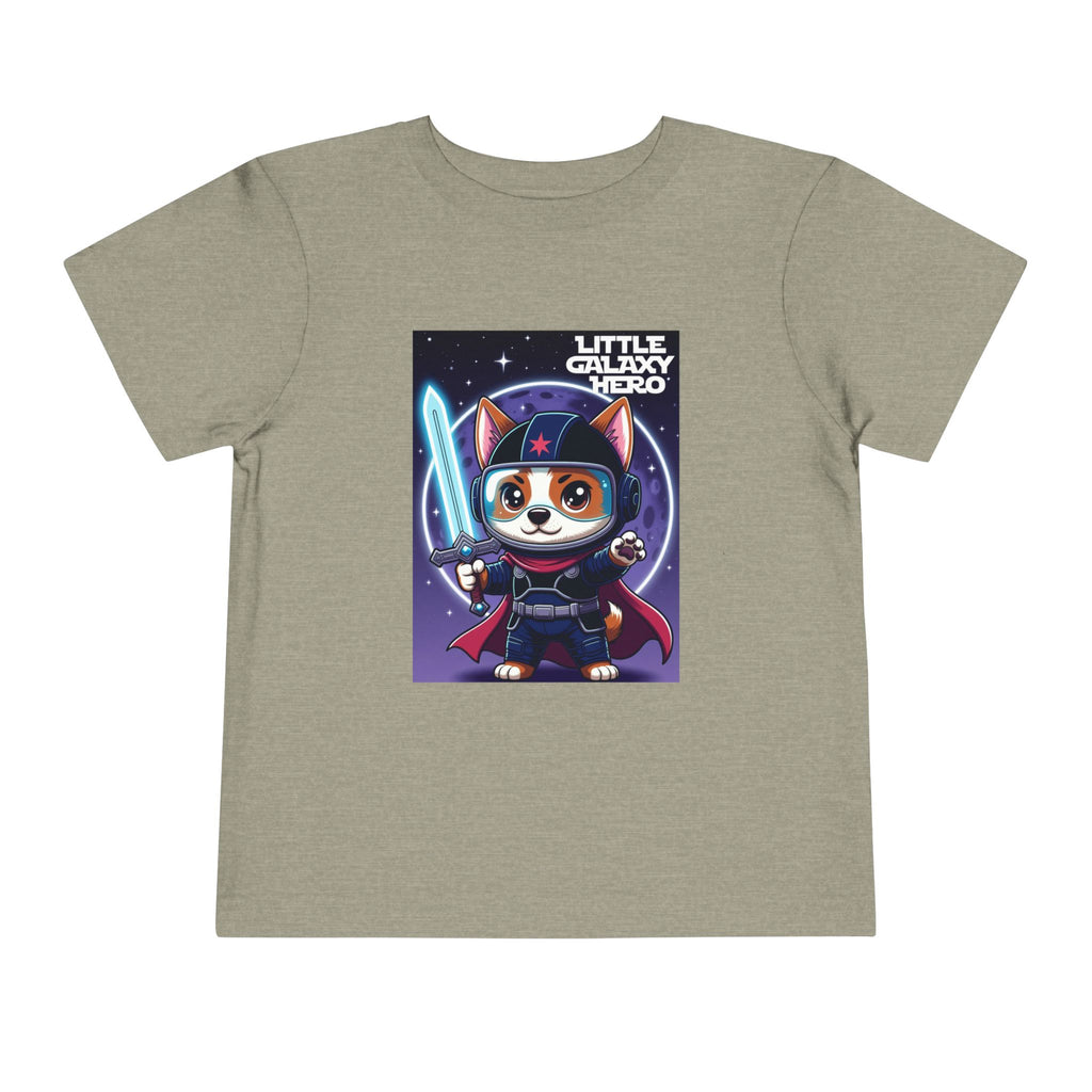 Little Galaxy Hero kids t-shirt in light brown featuring a cartoon space puppy wearing a helmet and holding a lightsaber.