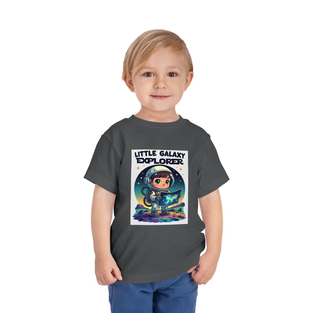 Gray kids' t-shirt featuring a cute astronaut character and the text "Little Galaxy Explorer" on the front.